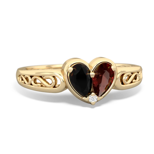 onyx-garnet filligree ring