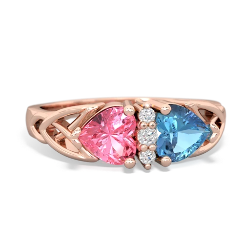 pink sapphire-blue topaz celtic ring