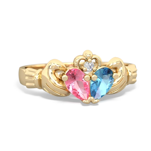 pink sapphire-blue topaz claddagh ring