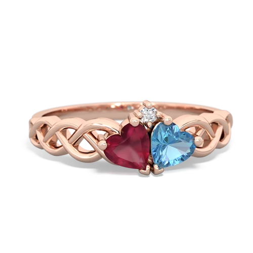 ruby-blue topaz celtic braid ring