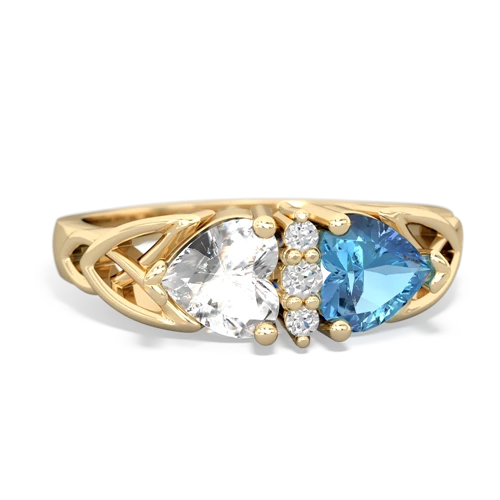 white topaz-blue topaz celtic ring