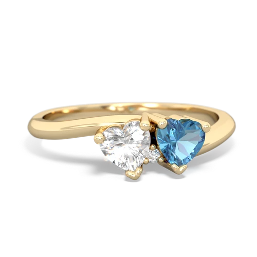 white topaz-blue topaz sweethearts promise ring